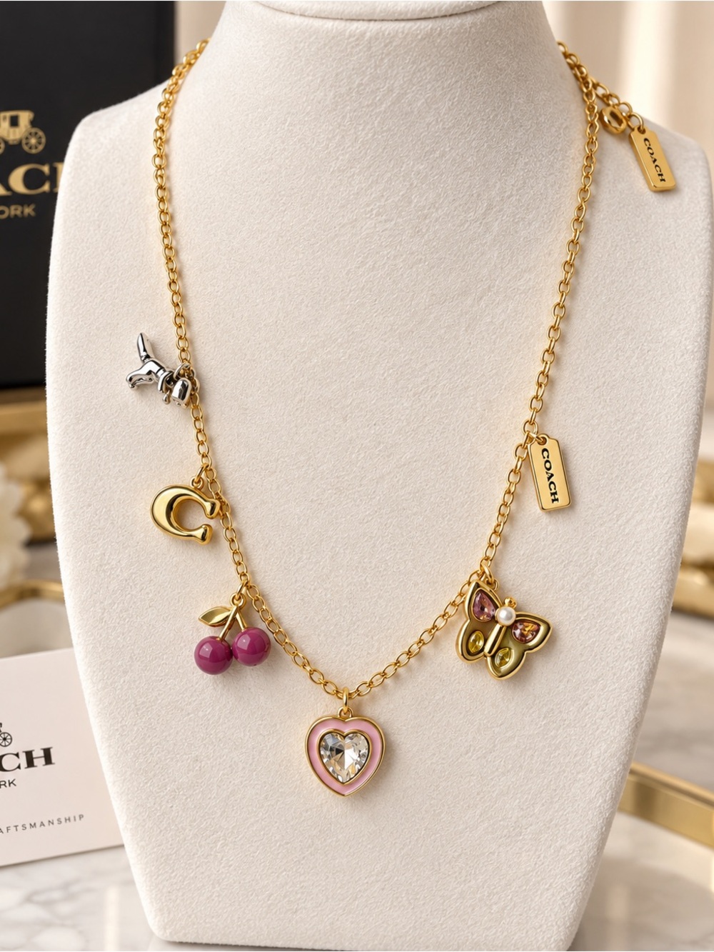 Coach Gold-Tone Charm Necklace with Pink Heart and Multicolor Charms